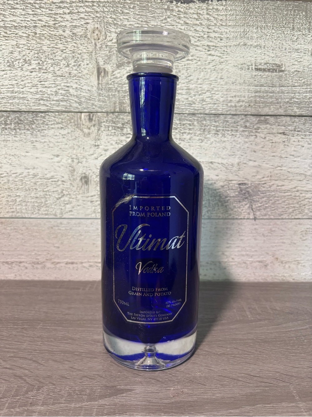 Vintage Ultimat Vodka from Poland blue glass decanter with top